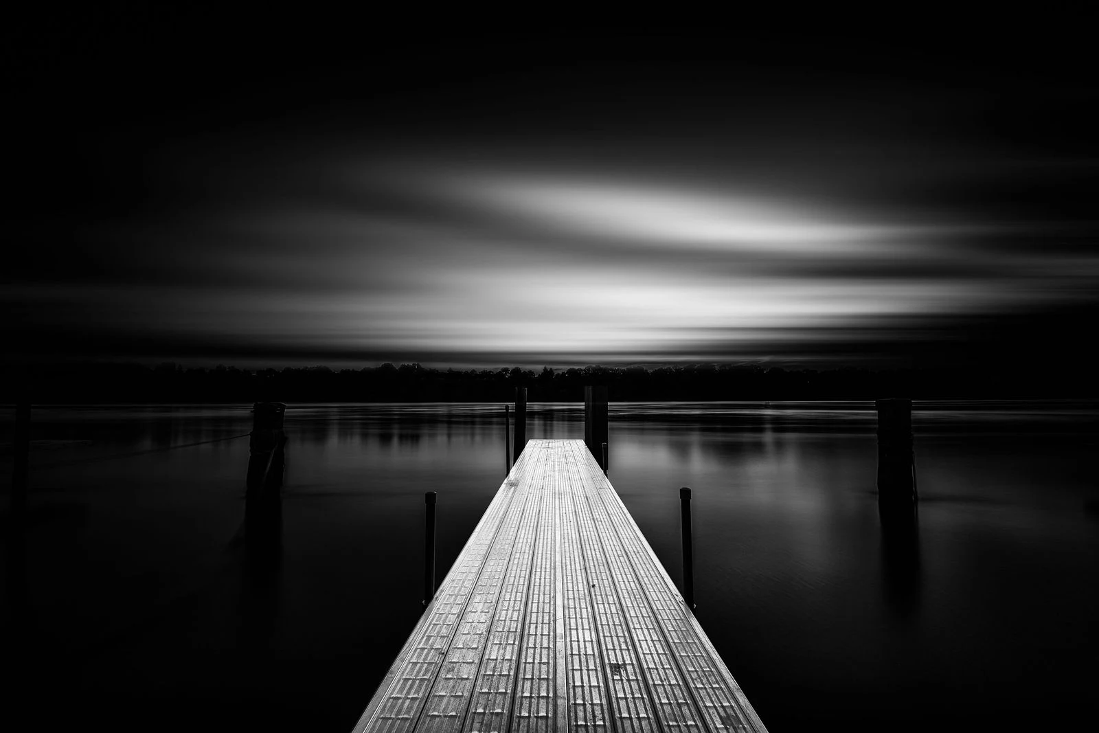Pier into darkness — monochrome